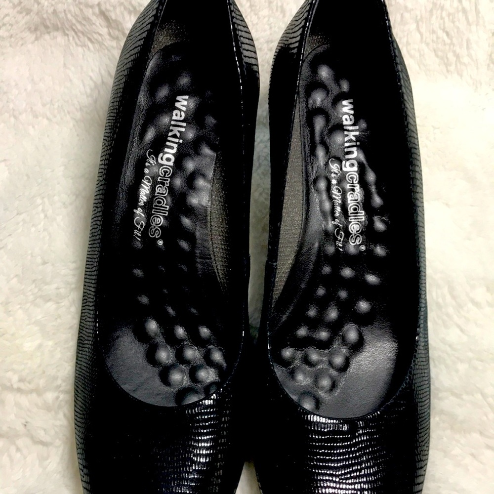 New shoes never worn. Size 7 med. Black  2" heel.     (Cat note for sale)...